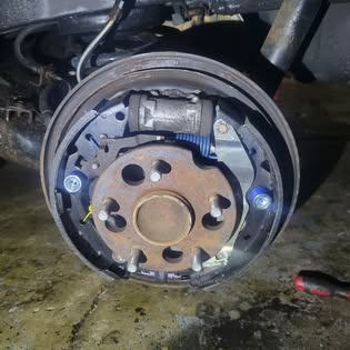 Rear drum brake service in progress at Mechanic Bhai